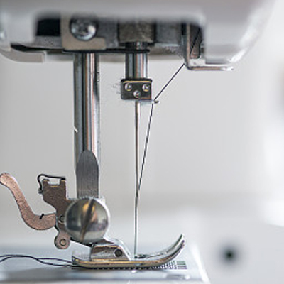 Huvudkomponenter av industriell symaskin