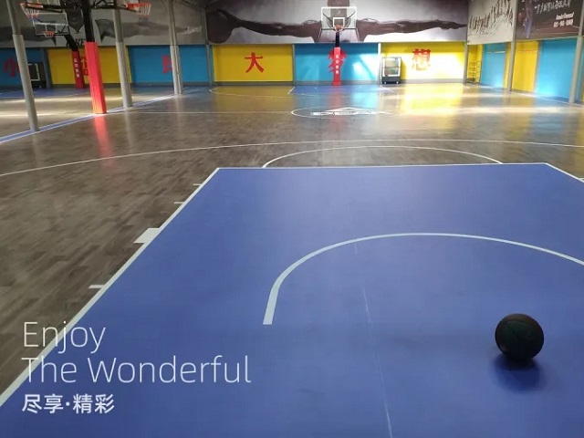 Basketball court flooring add bright color for sports space