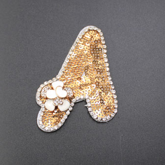 V Shape Gold Colored Sequin Chain Trim