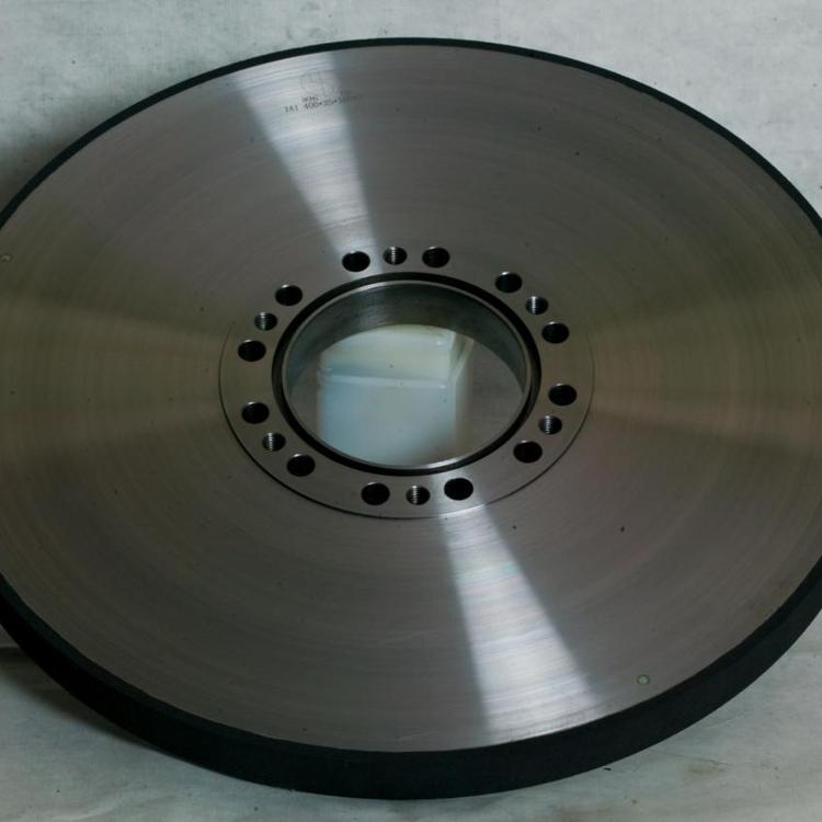 Electroplated diamond grinding wheel with double rotating