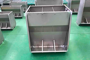 Stainless steel pig trough.