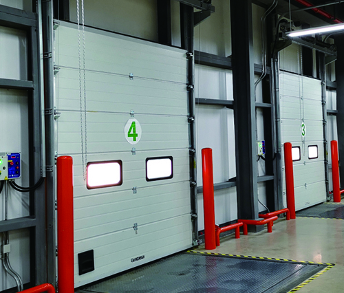 What is the difference between an industrial lift door and a rolling door? 