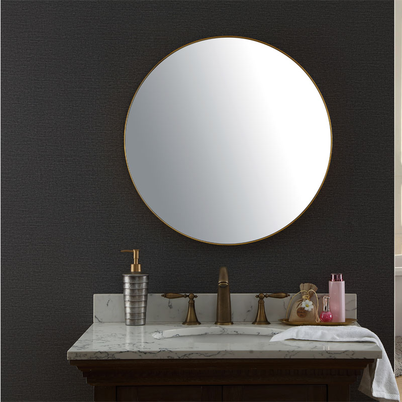 Inovativno okroglo stensko ogledalo z okvirjem iz nerjavečega jekla dvigne dekoracijo doma na višjo raven