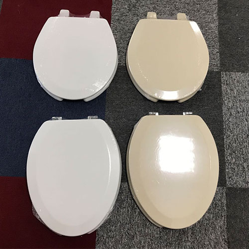 Toalettsete i ben av tre