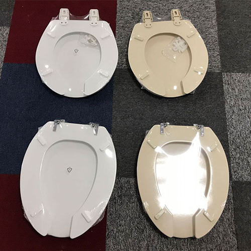 Toalettsete i ben av tre