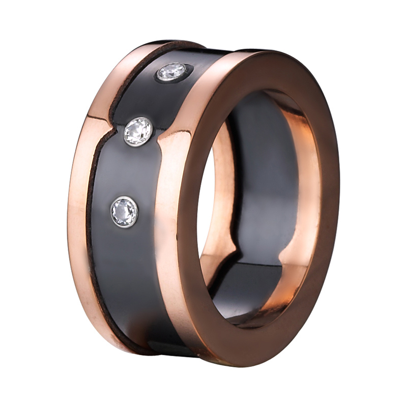 Керамички прстен во црна боја исечени челични ленти во розово златна нијанса