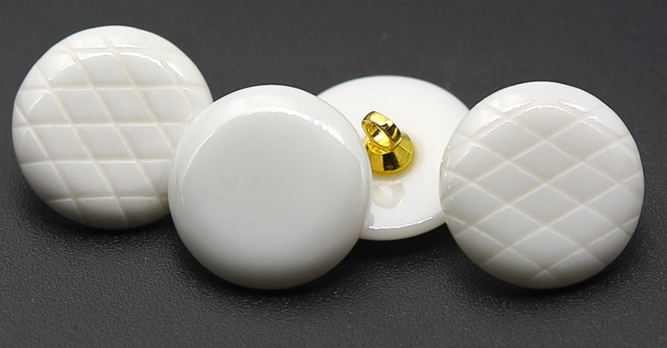 Shank zirconia ceramic buttons with reticular