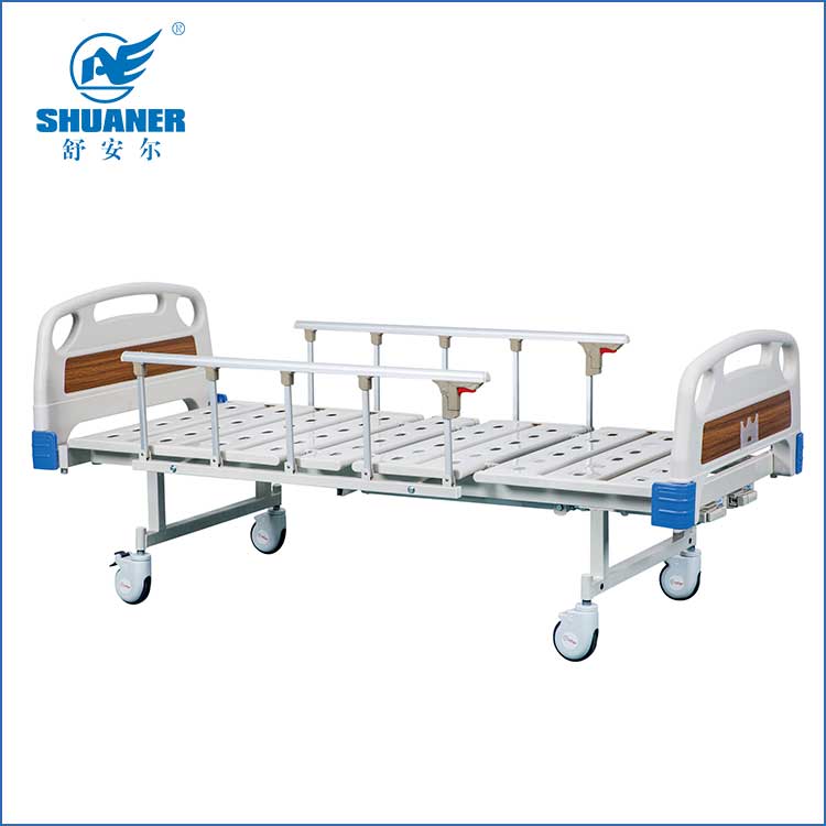 Handmatig bed met twee functies en aluminium inklapbaar zijhek