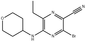 3-bromo-6-ethyl-5-((tetrahydro-2H-pyran-4-yl)amino)pyrazine-2-carbonitrile