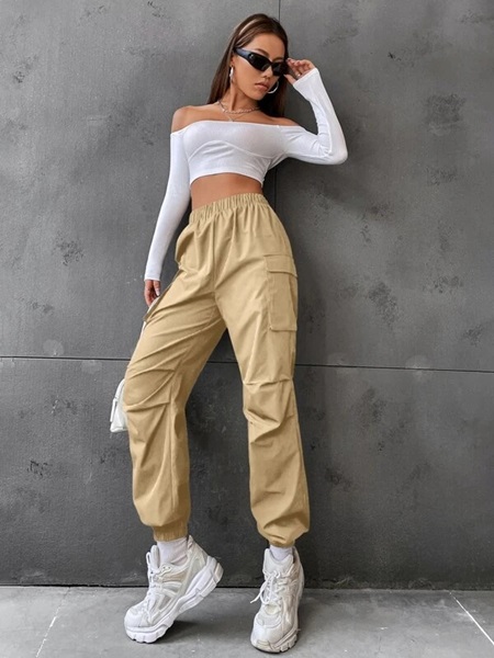 What are the side pockets on cargo pants called and what is it designed for?