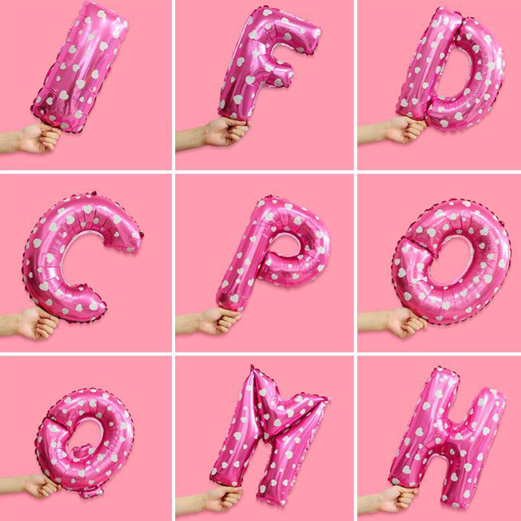 Pink letter balloons