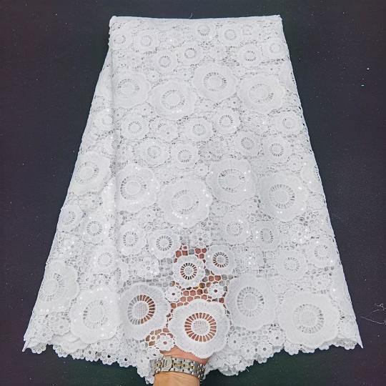 Tessuto paillettes bianco per abito da sposa
