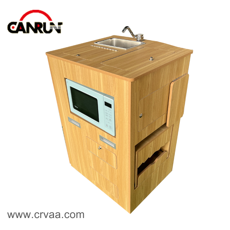 Mobilna prenosna škatla Vanlife z majhnim pomivalnim koritom in prostorom za mikrovalovno pečico