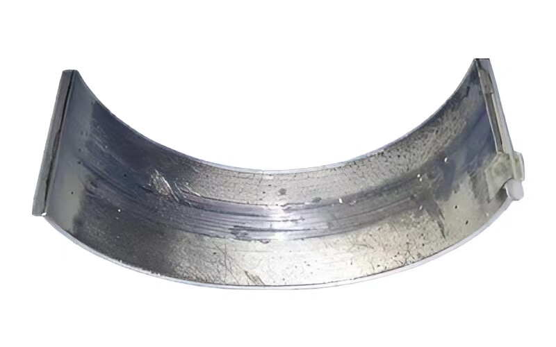 Analysis of scratches and metal particles on the inner surface of the bearing after operation