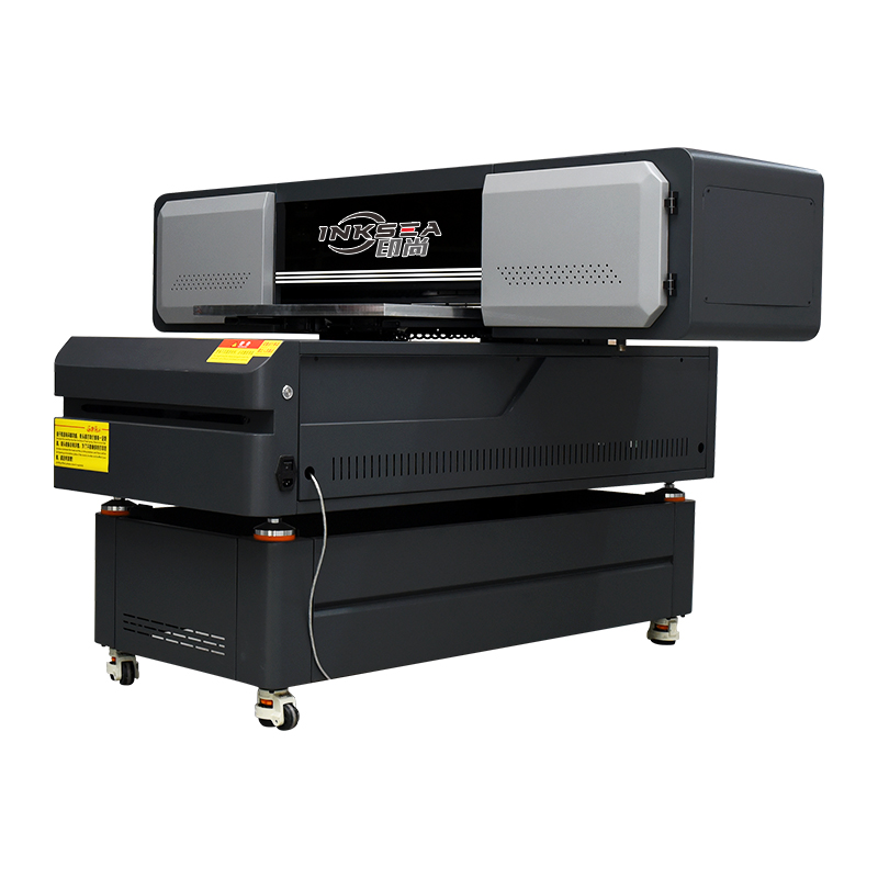 6090 गारमेंट प्रिंटिंग प्रेस फ्लॅट प्लेट डायरेक्ट प्रिंटिंग मशीन यूव्ही इंकजेट प्रिंटर