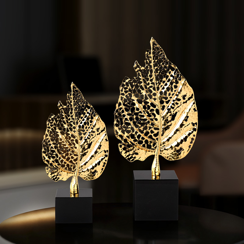 Gold hollowed out leaf ornaments