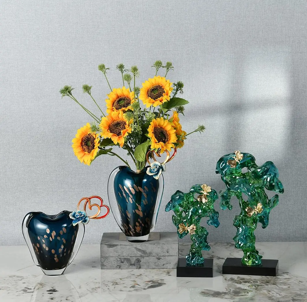 Rundecor Launches New Collection of Modern Art Home Decor: Blue Glass Vases and Resin Sculptures