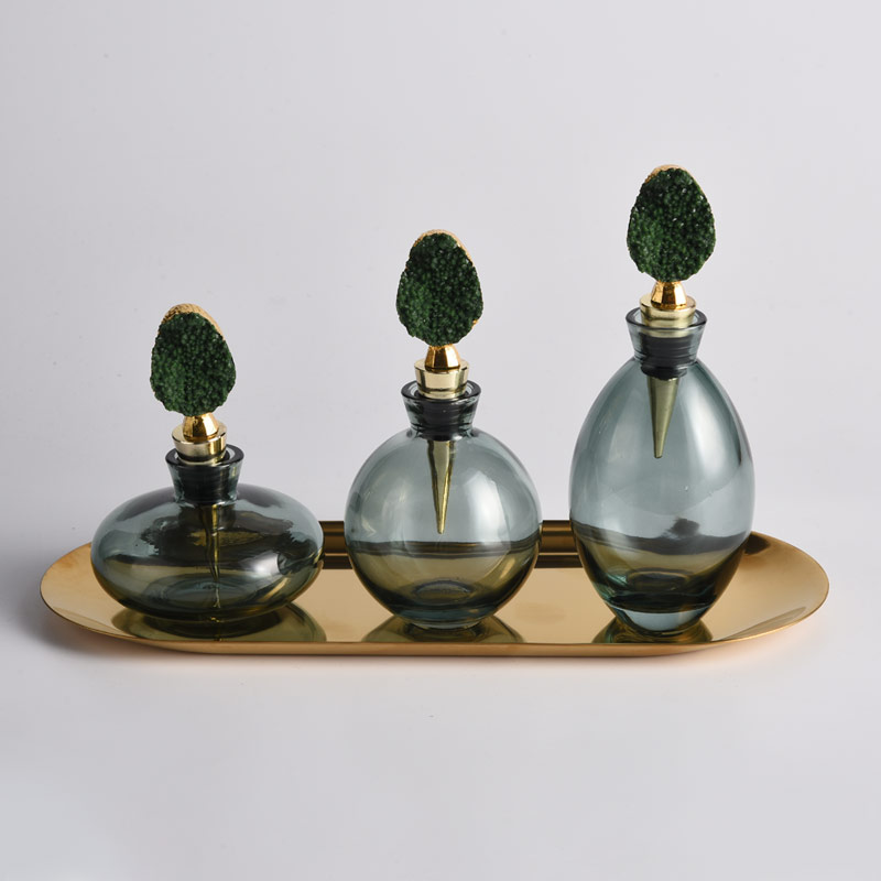 Set of 4 elegant and fashionable soft furnishings dark green fragrance bottles