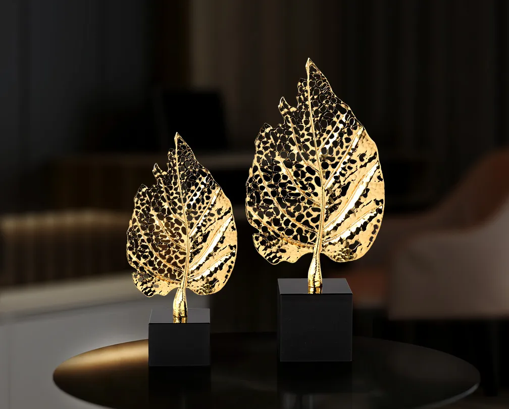 Gold hollowed out leaf ornaments