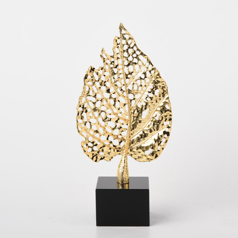 Gold hollowed out leaf ornaments