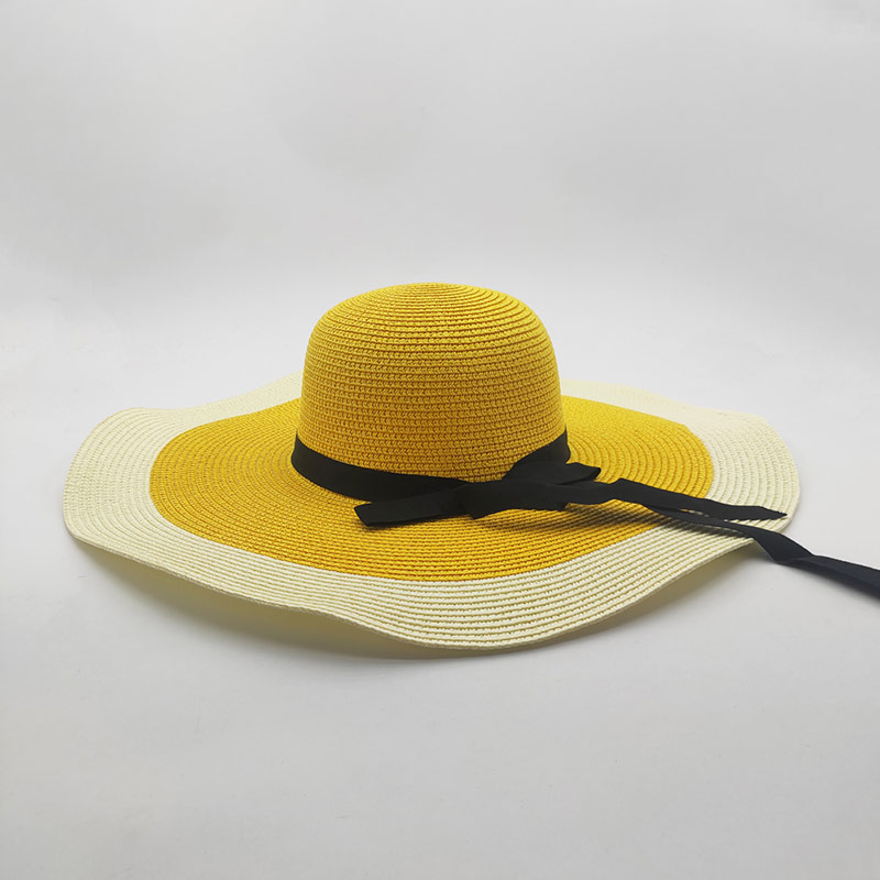 Cappelli flosci a treccia di carta economici per la spiaggia delle donne