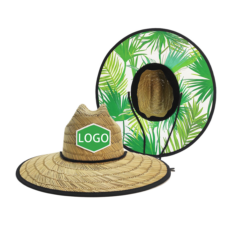 Słomkowy kapelusz ratownika z nadrukiem liści palmowych