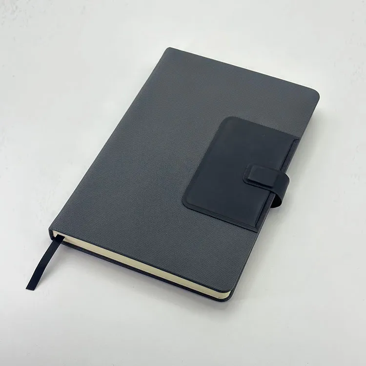 Bloc-notes avec porte-stylo intégré