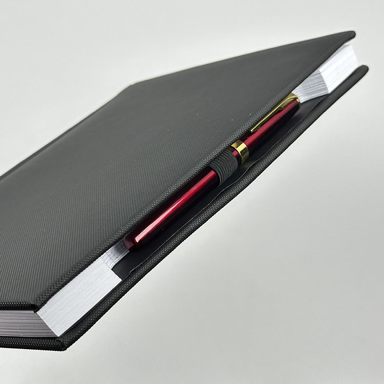 Caderno com suporte para caneta integrado - 9 