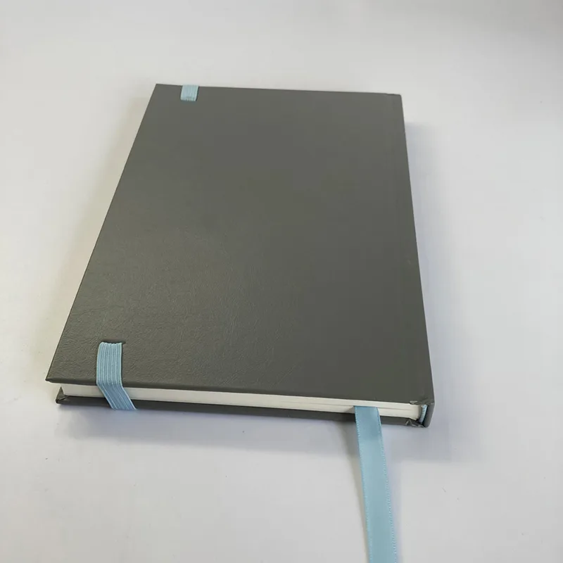 Cuaderno de PU con banda elástica y logotipo estampado en lámina