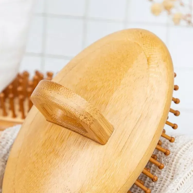 Mini spazzola per capelli in bambù