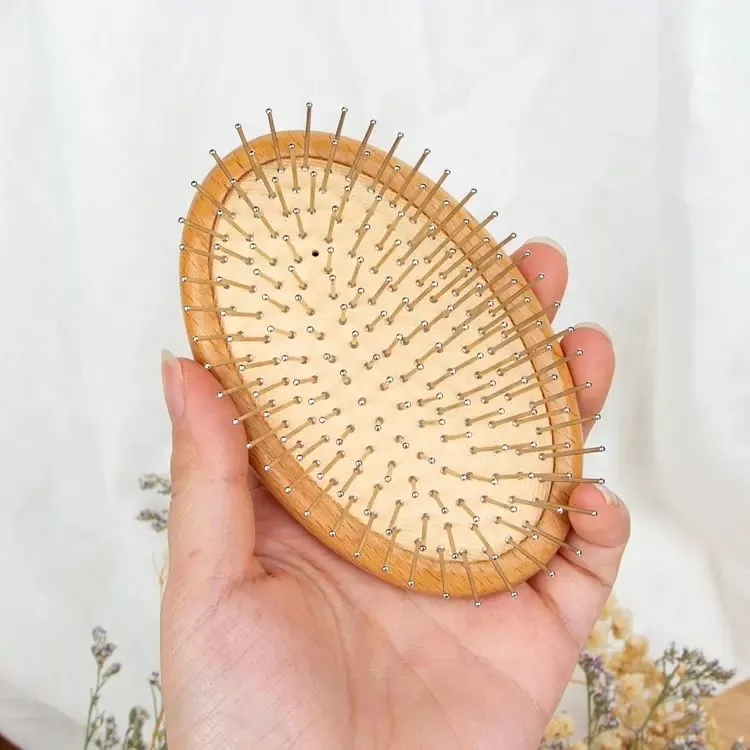 Spazzola per capelli con perno in legno