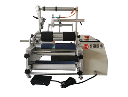 Cosmetic labeling machine
