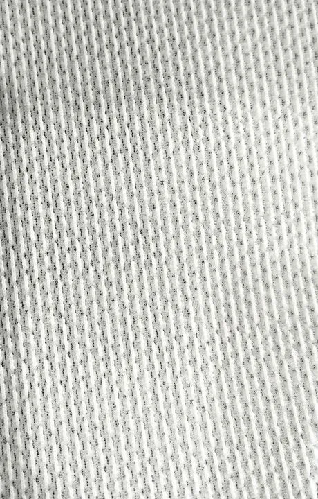 Material jacquard Tejido 100% poliéster.