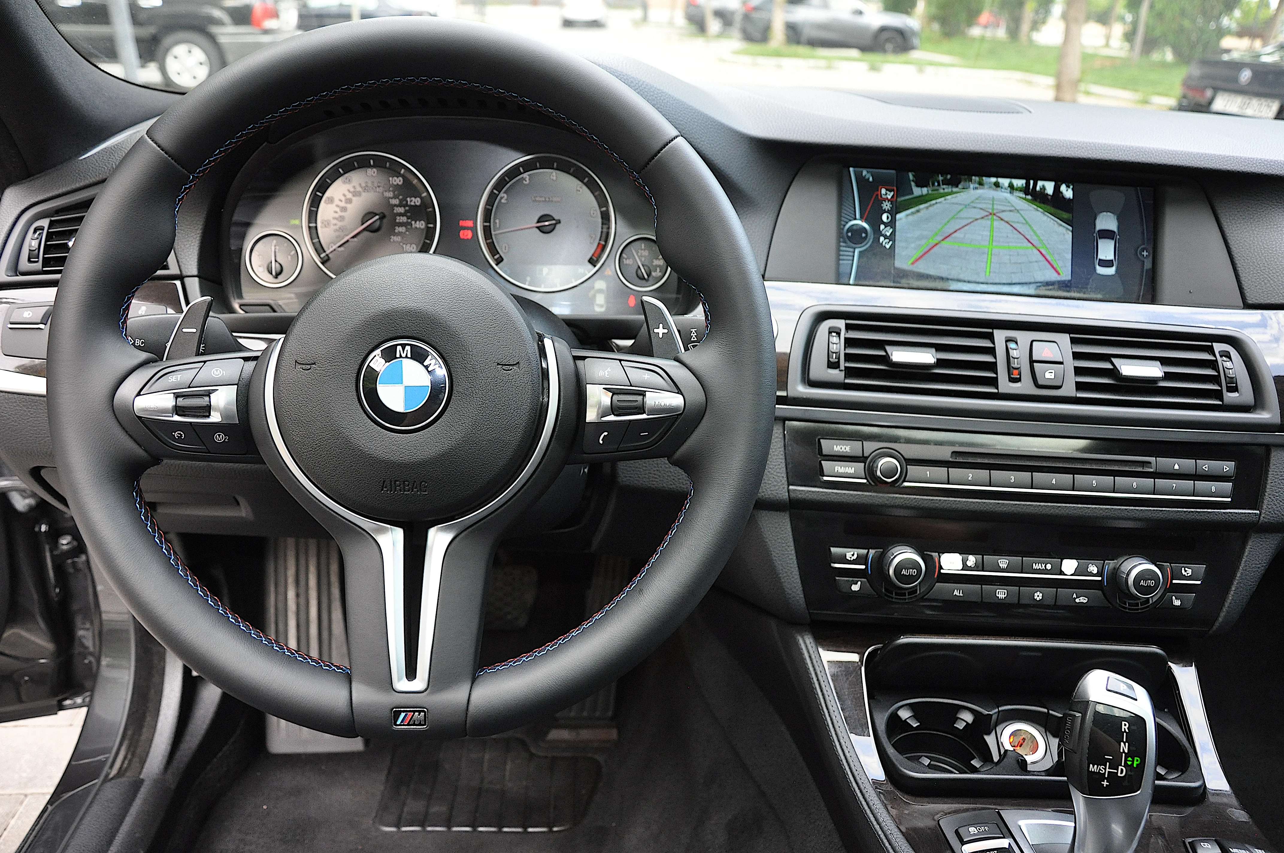 A BMW Leather Steering Wheel showcasing its luxurious design and comfort.