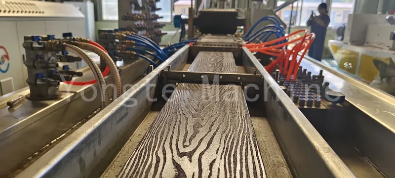 Rubber and wood composite decking machine tested successfully